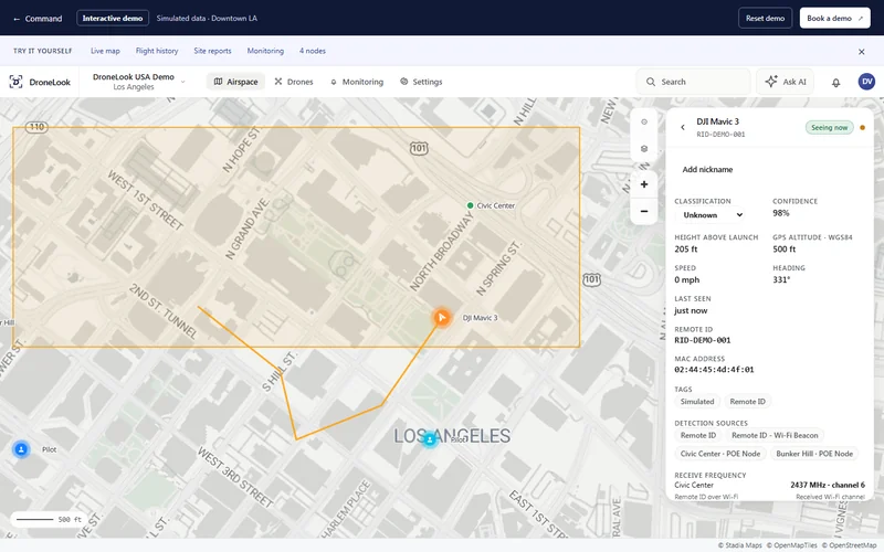DroneLook Command demo showing four simulated drones and four receiving nodes across Downtown Los Angeles